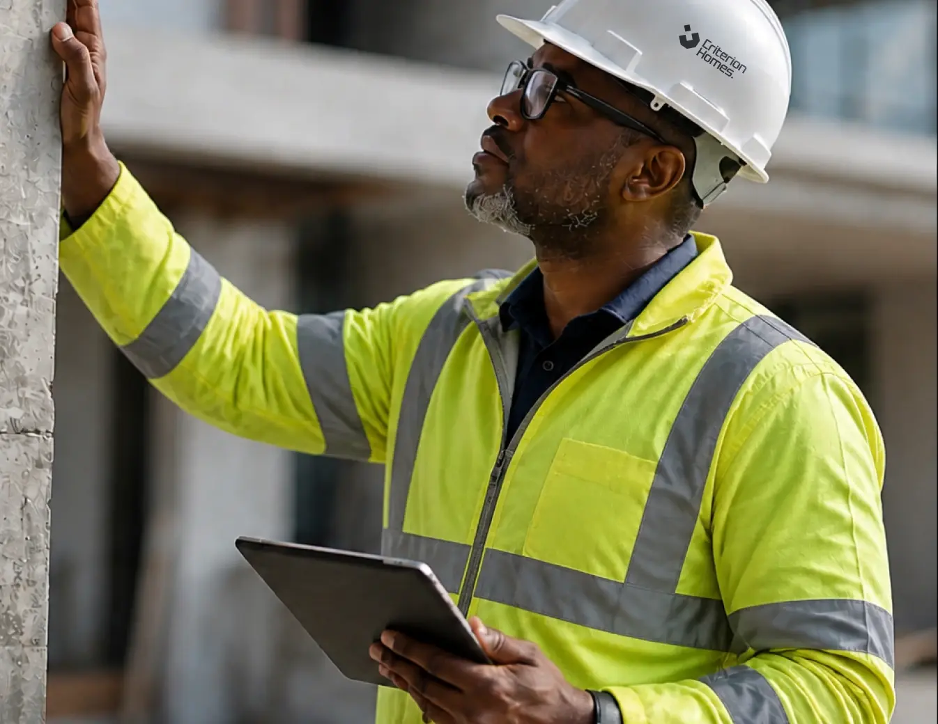 A Criterion Homes engineer reviewing drawings on site at The Midtown Terraces